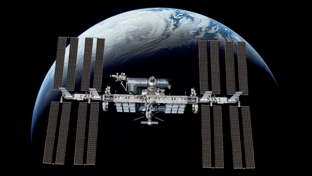Image of international space station showing that parts in orbit can be made stronger, lighter and faster.